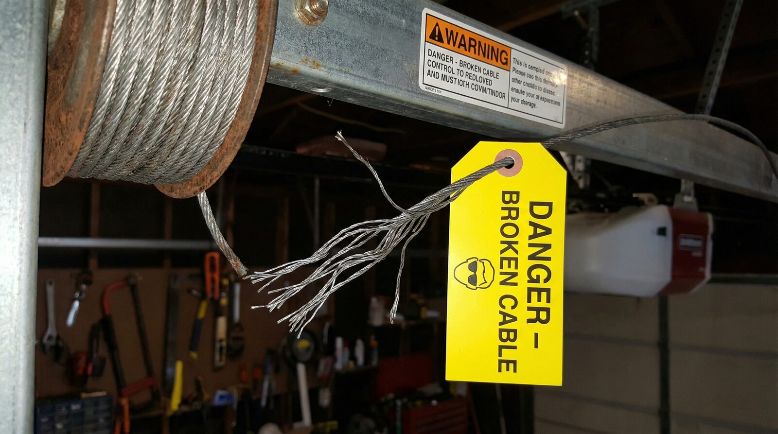 Is It Safe to Use a Garage Door with a Broken Cable — featured article cover image.