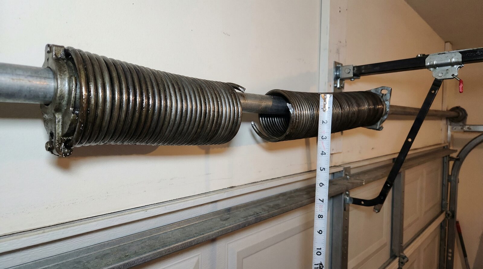 How Do I Know If My Garage Door Spring Is Broken — featured article cover image.