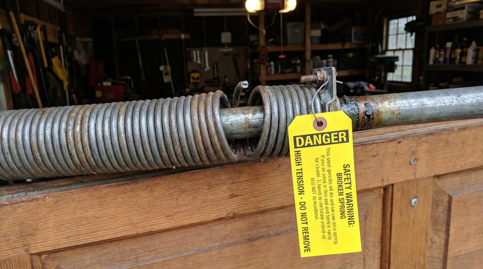 Can You Safely Use a Garage Door with a Broken Spring in Norristown — featured article cover image.