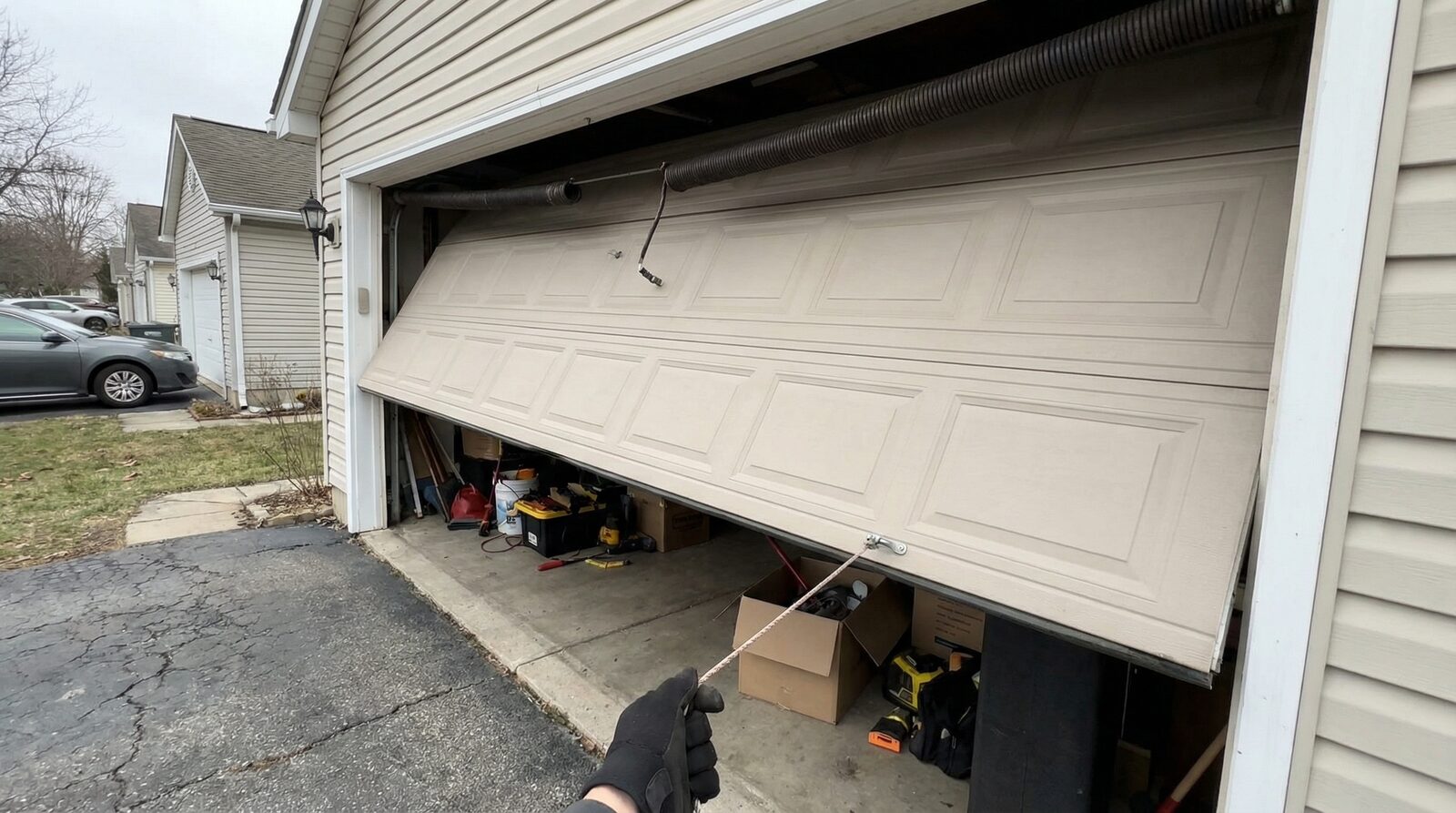 Can You Manually Open a Garage Door With a Broken Spring — featured article cover image.