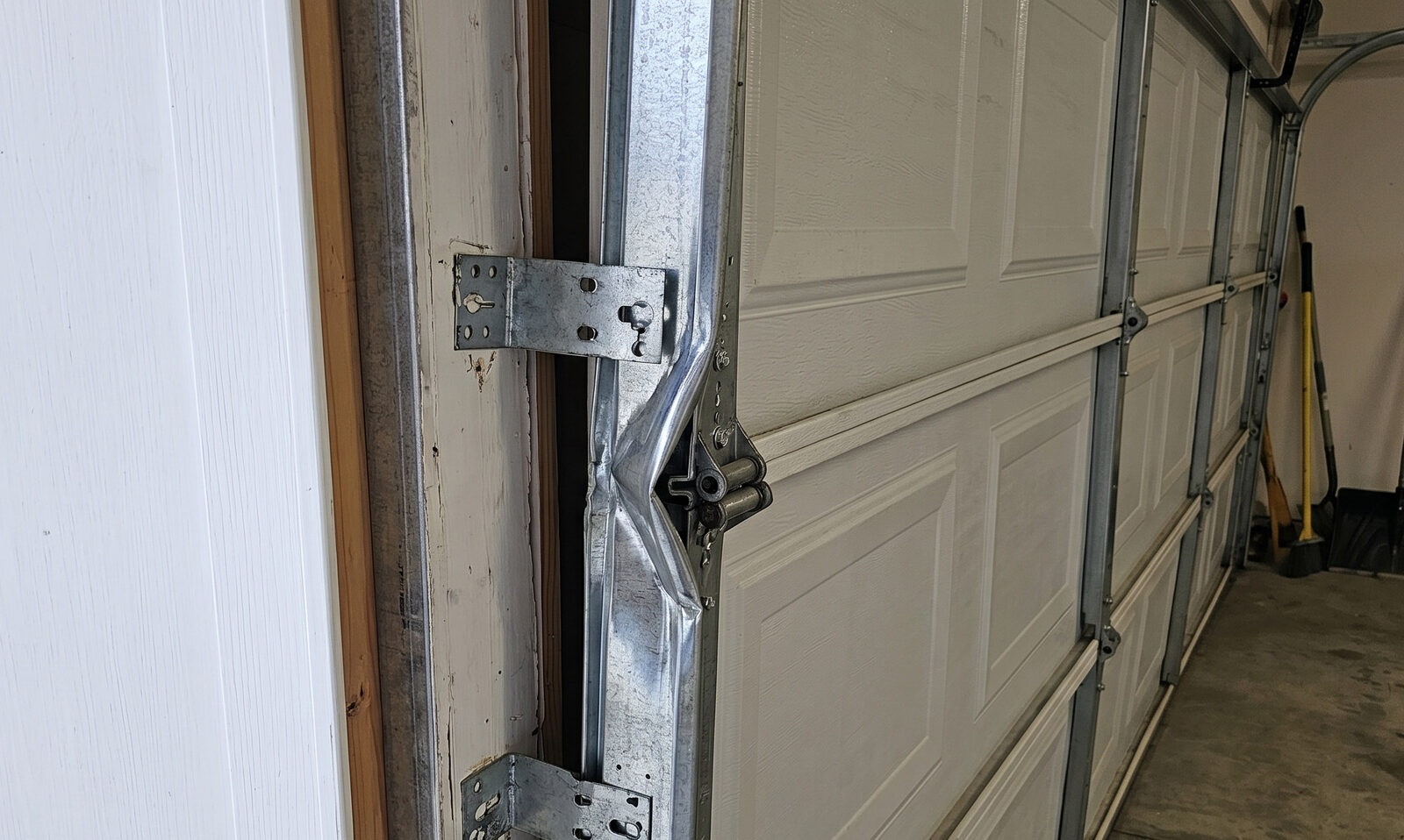 Bent garage door track