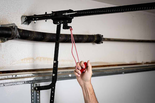 Garage Door Spring Broke in Philadelphia: Here Is What To Do Right Now — article cover image.
